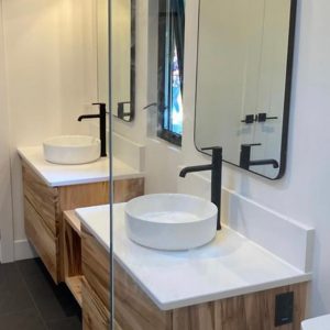 Floating-vanities-ambrosia-maple-clearcoat-slab-drawer-fronts